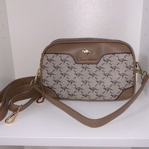 Cross body/ shoulder/ wristlet bag